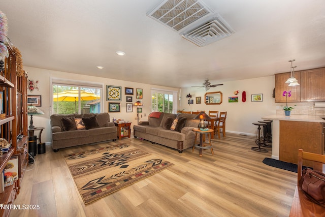 644 Carmel Way, Gardnerville, NV 89460 - living room with light wood-type flooring, a ceiling fan, and recessed lighting