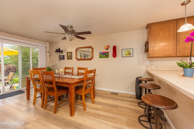644 Carmel Way, Gardnerville, NV 89460 - dining space featuring light wood-type flooring and ceiling fan