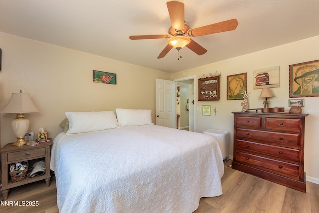 644 Carmel Way, Gardnerville, NV 89460 - bedroom featuring light wood-style flooring and ceiling fan