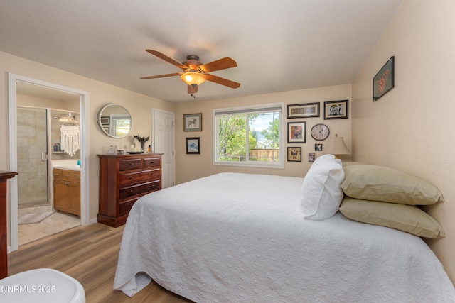 644 Carmel Way, Gardnerville, NV 89460 - bedroom featuring light wood-style floors, ceiling fan, and ensuite bathroom