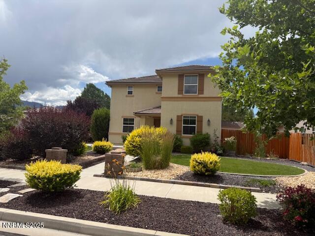 1108 Tuscan Ct, Minden, NV 89423 - traditional-style house with stucco siding