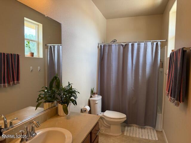 1108 Tuscan Ct, Minden, NV 89423 - bathroom with vanity, shower / bathtub combination with curtain, and tile patterned flooring