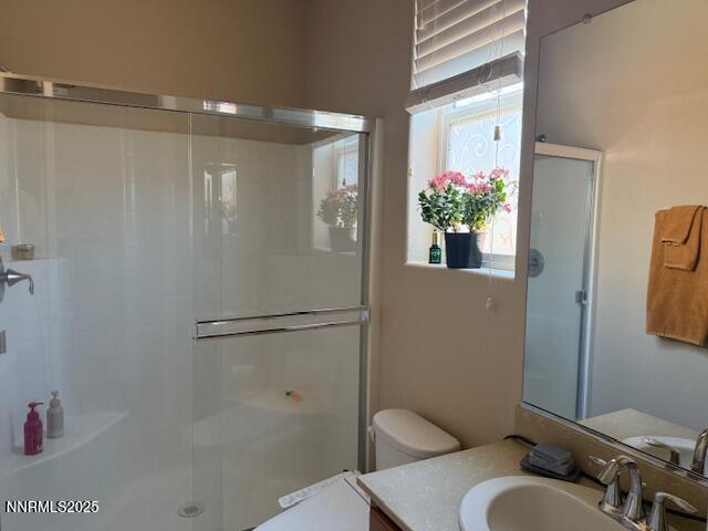 1108 Tuscan Ct, Minden, NV 89423 - bathroom featuring a stall shower and vanity