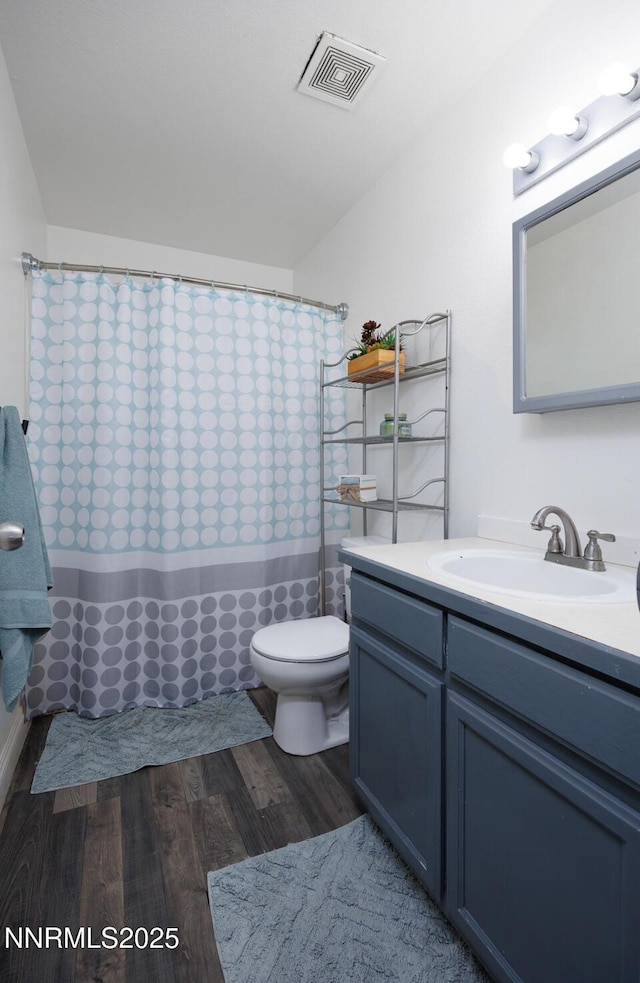 1866 Albert St, Fallon, NV 89406 - full bathroom featuring vanity and wood finished floors