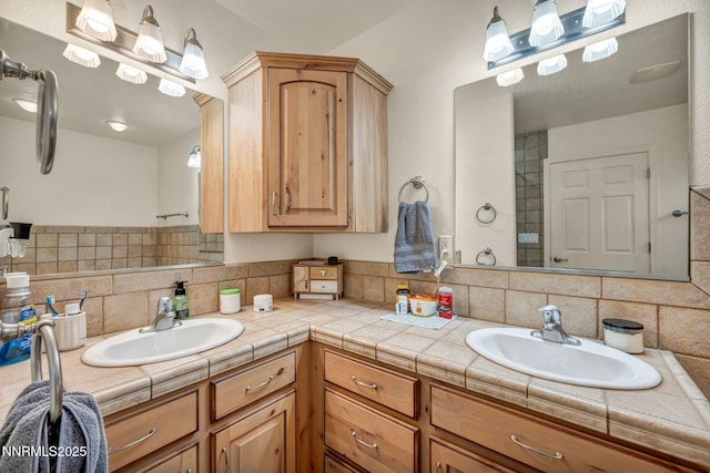 8030 Verde Ct, Winnemucca, NV 89445 - full bathroom featuring double vanity and tasteful backsplash