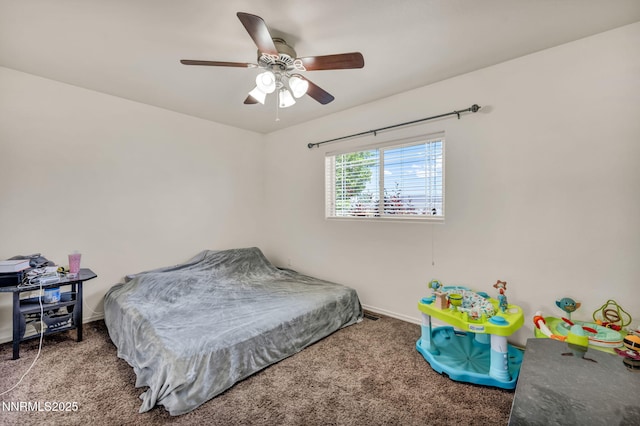 8030 Verde Ct, Winnemucca, NV 89445 - carpeted bedroom featuring baseboards and ceiling fan