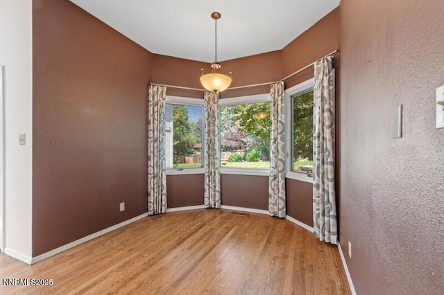 2126 Thomas Jefferson Dr, Reno, NV 89509 - unfurnished room with wood finished floors and baseboards