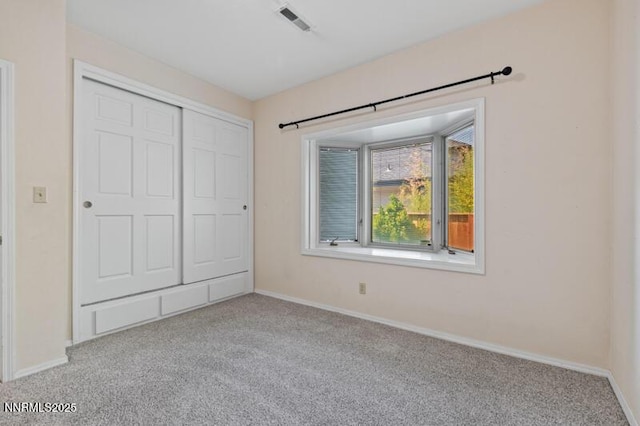 2126 Thomas Jefferson Dr, Reno, NV 89509 - unfurnished bedroom featuring carpet flooring and a closet