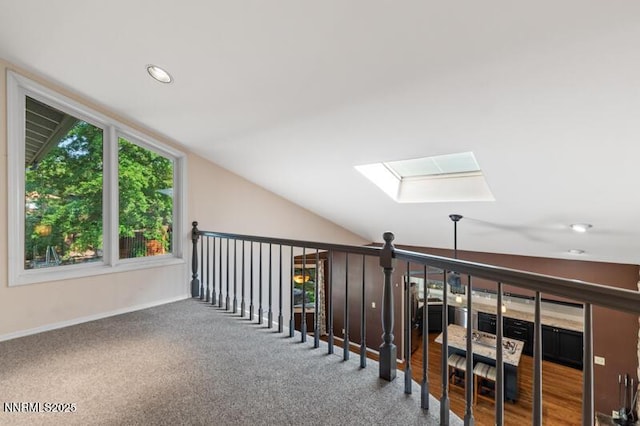 2126 Thomas Jefferson Dr, Reno, NV 89509 - corridor with a skylight, recessed lighting, and vaulted ceiling