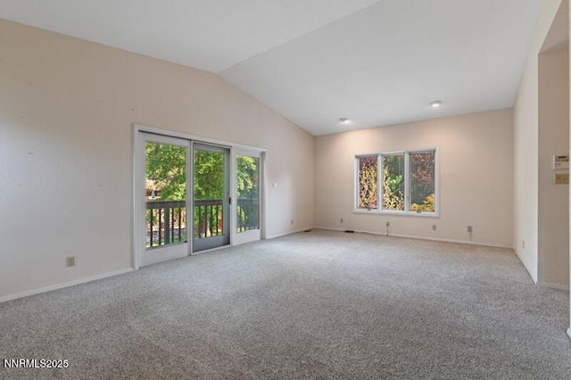 2126 Thomas Jefferson Dr, Reno, NV 89509 - unfurnished room with healthy amount of natural light, carpet flooring, and vaulted ceiling