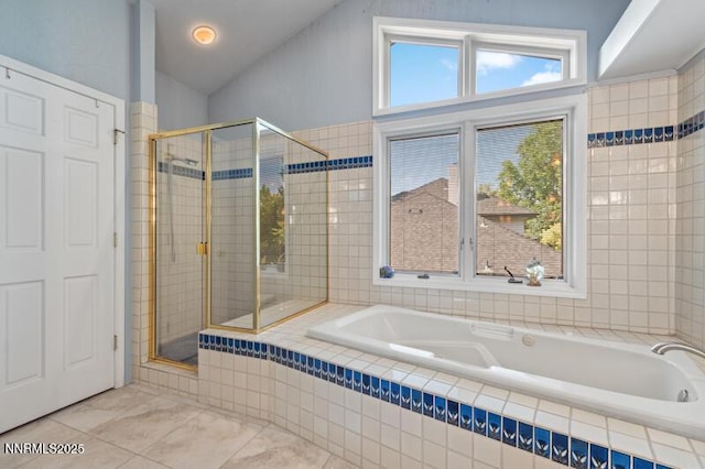 2126 Thomas Jefferson Dr, Reno, NV 89509 - full bathroom with a bath, a stall shower, and lofted ceiling