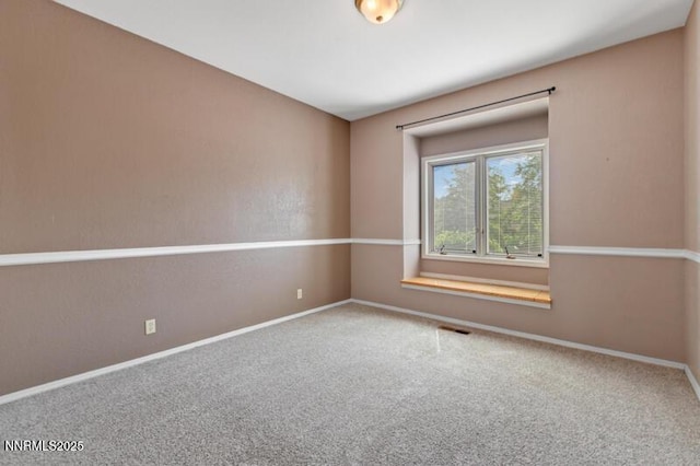 2126 Thomas Jefferson Dr, Reno, NV 89509 - spare room featuring carpet flooring and baseboards
