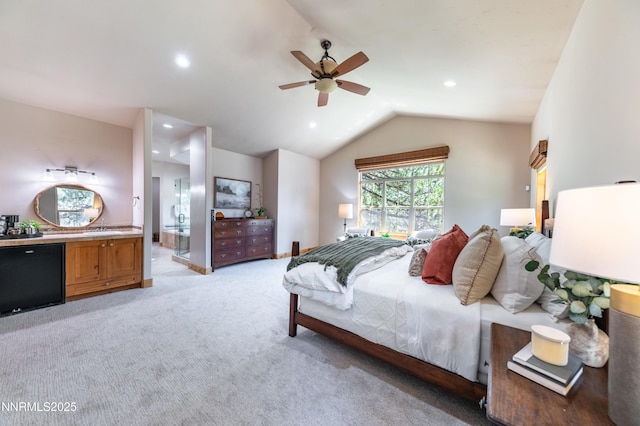 48 Rose Creek Ln, Reno, NV 89511 - bedroom with light colored carpet, vaulted ceiling, recessed lighting, ensuite bath, and ceiling fan