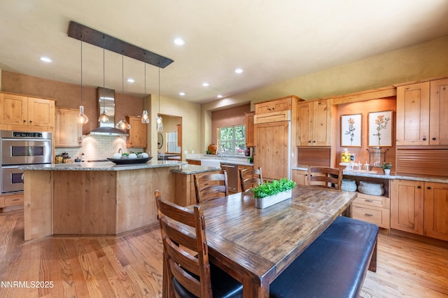 48 Rose Creek Ln, Reno, NV 89511 - dining room featuring light wood finished floors and recessed lighting
