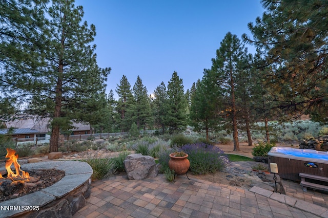 48 Rose Creek Ln, Reno, NV 89511 - view of patio / terrace featuring a hot tub and a fire pit