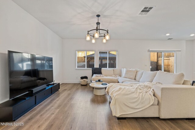 1413 Solitude Trl, Reno, NV 89523 - living area with a chandelier, wood finished floors, and recessed lighting