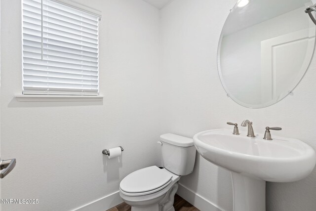 1413 Solitude Trl, Reno, NV 89523 - bathroom featuring wood finished floors and toilet
