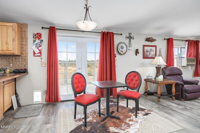 6297 Cox Rd, Fallon, NV 89406 - dining space with wood finished floors, cooling unit, and french doors