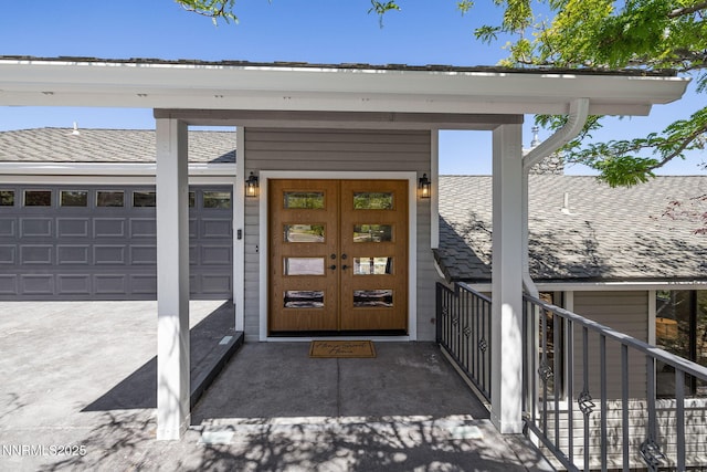 3575 Cashill Blvd, Reno, NV 89509 - entrance to property featuring roof with shingles, a garage, and driveway