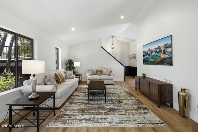 3575 Cashill Blvd, Reno, NV 89509 - living room with wood finished floors, lofted ceiling, and recessed lighting