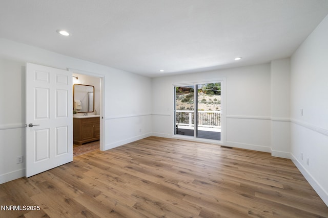 3575 Cashill Blvd, Reno, NV 89509 - spare room with light wood finished floors and recessed lighting