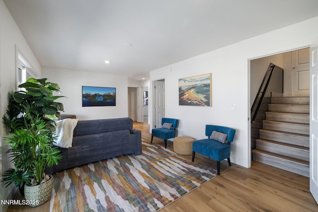 3575 Cashill Blvd, Reno, NV 89509 - living area with wood finished floors, stairway, and recessed lighting