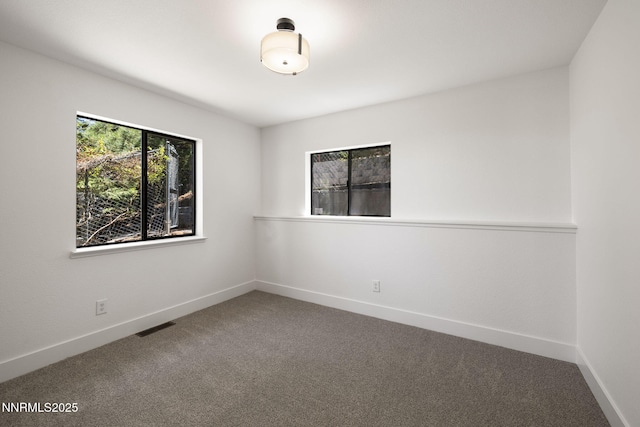 3575 Cashill Blvd, Reno, NV 89509 - spare room featuring carpet flooring and baseboards