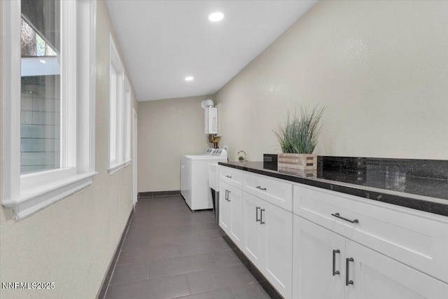 1094 Johnson Blvd, South Lake Tahoe, CA 96150 - laundry area with washing machine and clothes dryer, recessed lighting, cabinet space, and dark tile patterned floors