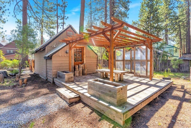 1094 Johnson Blvd, South Lake Tahoe, CA 96150 - wooden terrace featuring an outbuilding and a pergola