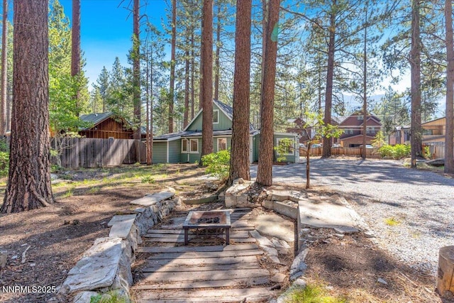 1094 Johnson Blvd, South Lake Tahoe, CA 96150 - view of yard with a fire pit