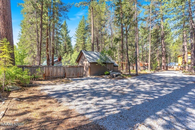 1094 Johnson Blvd, South Lake Tahoe, CA 96150 - view of side of home with a storage unit