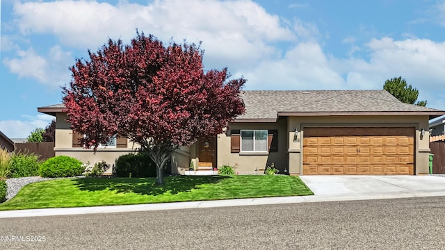 3287 Hackamore Way, Winnemucca, NV 89445 - view of front of home featuring stucco siding, an attached garage, a front lawn, and a shingled roof