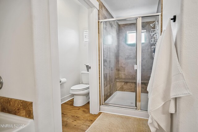 3287 Hackamore Way, Winnemucca, NV 89445 - bathroom featuring a stall shower, wood finished floors, and a bathtub