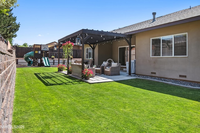 3287 Hackamore Way, Winnemucca, NV 89445 - fenced backyard with an outdoor living space, a playground, and a patio