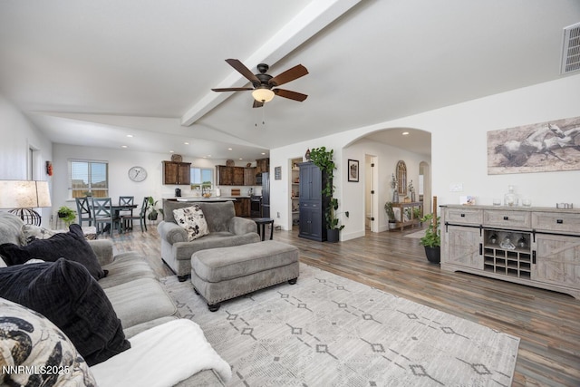776 Kinsli St, Fallon, NV 89406 - living area featuring ceiling fan, arched walkways, recessed lighting, and wood finished floors