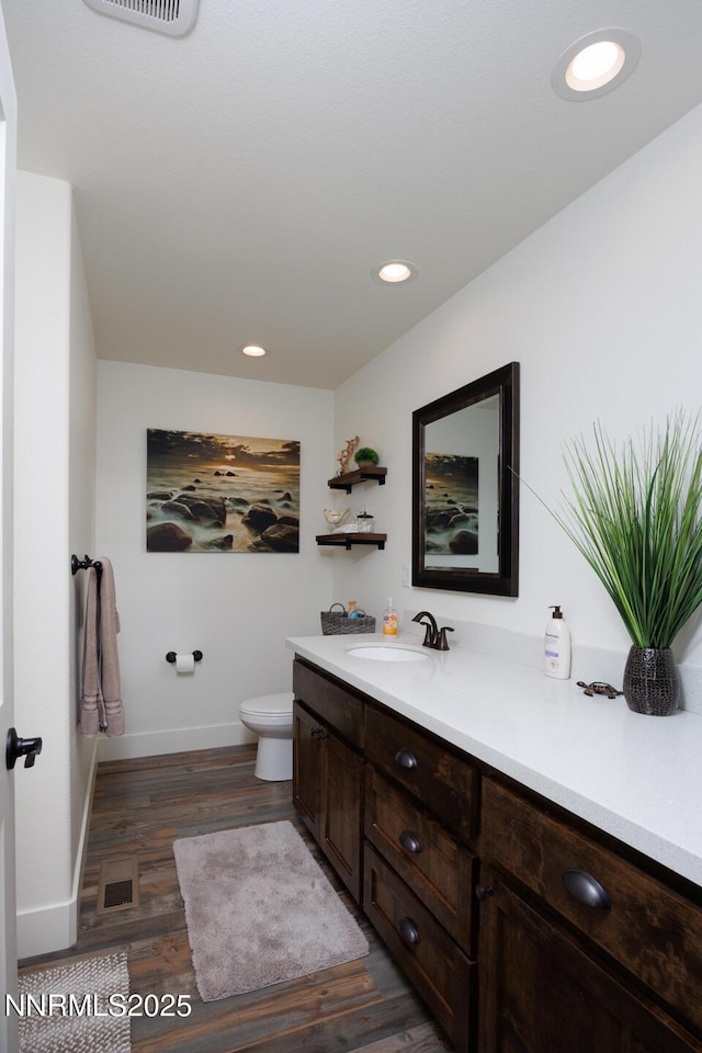 776 Kinsli St, Fallon, NV 89406 - bathroom with vanity, wood finished floors, and recessed lighting
