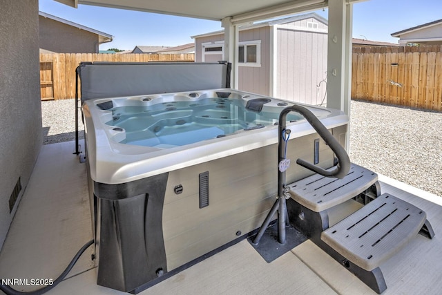 776 Kinsli St, Fallon, NV 89406 - view of patio / terrace featuring a shed and a hot tub