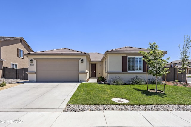 7106 Owl Vw Dr, Sparks, NV 89436 - single story home with stucco siding, a tiled roof, a garage, and concrete driveway