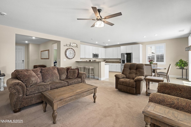 7106 Owl Vw Dr, Sparks, NV 89436 - living room featuring ceiling fan, light carpet, and recessed lighting