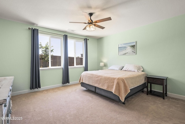 7106 Owl Vw Dr, Sparks, NV 89436 - bedroom with light carpet and a ceiling fan