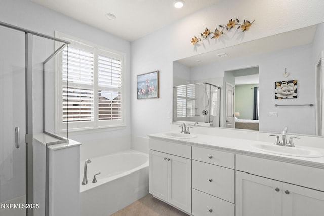 7106 Owl Vw Dr, Sparks, NV 89436 - bathroom with a shower stall, a garden tub, double vanity, and tile patterned floors