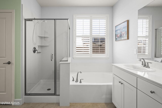 7106 Owl Vw Dr, Sparks, NV 89436 - bathroom with a stall shower, vanity, a bath, and plenty of natural light
