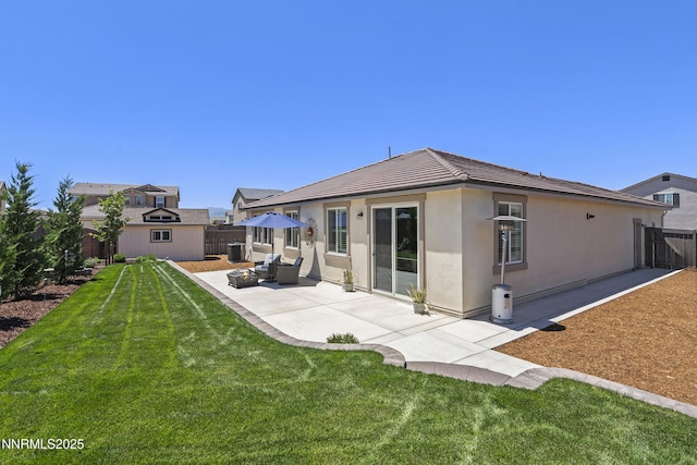 7106 Owl Vw Dr, Sparks, NV 89436 - back of house featuring a fenced backyard, a patio area, stucco siding, and a shed