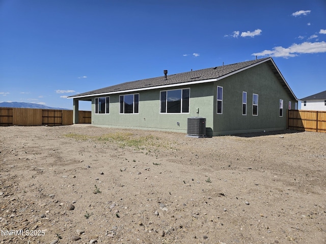 1219 Heybourne Rd, Gardnerville, NV 89410 - back of property with a fenced backyard and stucco siding