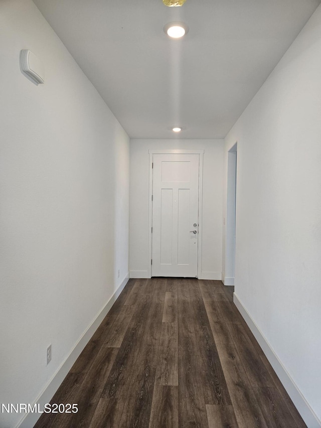 1219 Heybourne Rd, Gardnerville, NV 89410 - corridor with dark wood-type flooring and recessed lighting