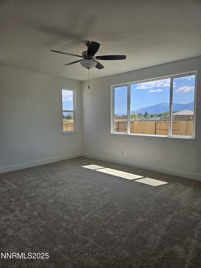 1219 Heybourne Rd, Gardnerville, NV 89410 - unfurnished room with carpet floors and ceiling fan