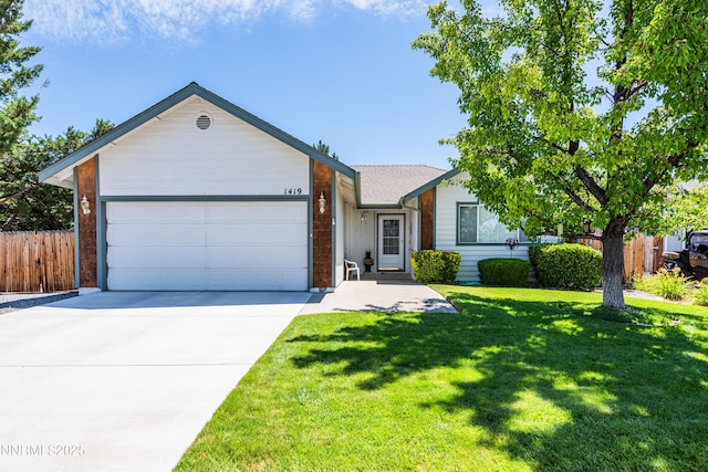 1419 Purple Sage Dr, Gardnerville, NV 89460 - ranch-style house with an attached garage and driveway