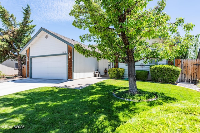 1419 Purple Sage Dr, Gardnerville, NV 89460 - view of front facade featuring a garage, concrete driveway, and an outdoor structure
