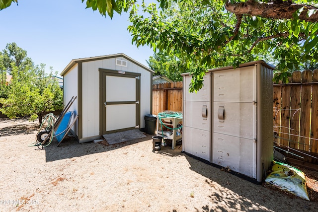 1419 Purple Sage Dr, Gardnerville, NV 89460 - view of shed with a fenced backyard