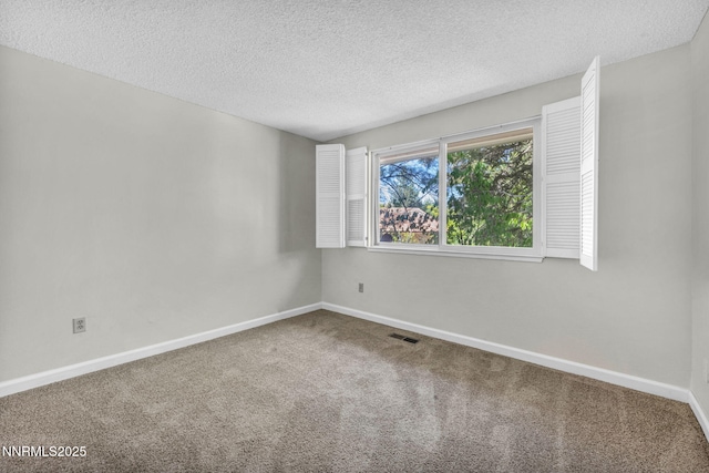 1425 Julie Ct, Reno, NV 89509 - carpeted spare room with baseboards and a textured ceiling